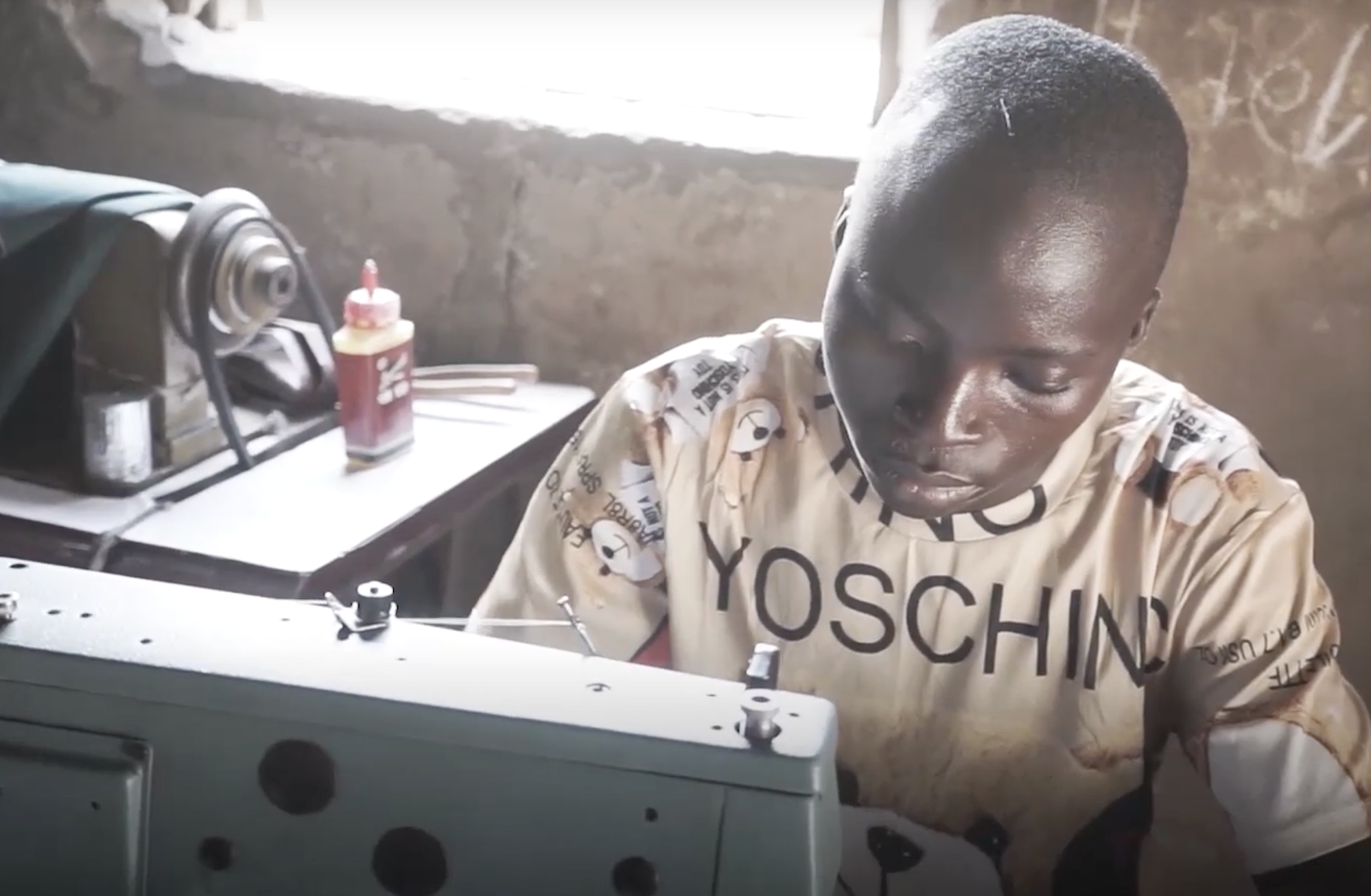 Man sews with a machine