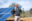 man standing in front of solar panel