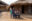 Children standing in front of a home in rural india